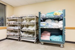 Large,Group,Of,Hospital,Supplies,Arranged,In,Trolleys
